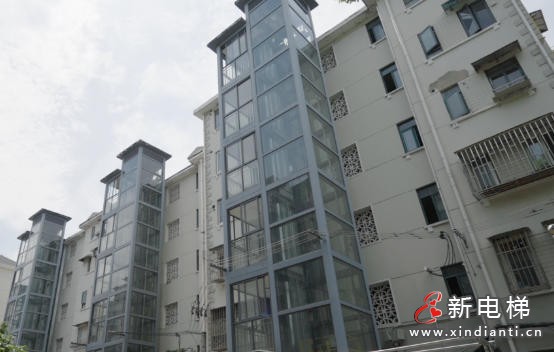 上海静安一老小区63台加装电梯全部投用